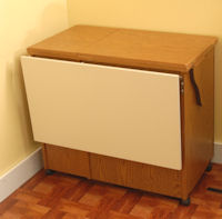 Arrow sewing cabinets, sewing tables, sewing furniture, and sewing storage.